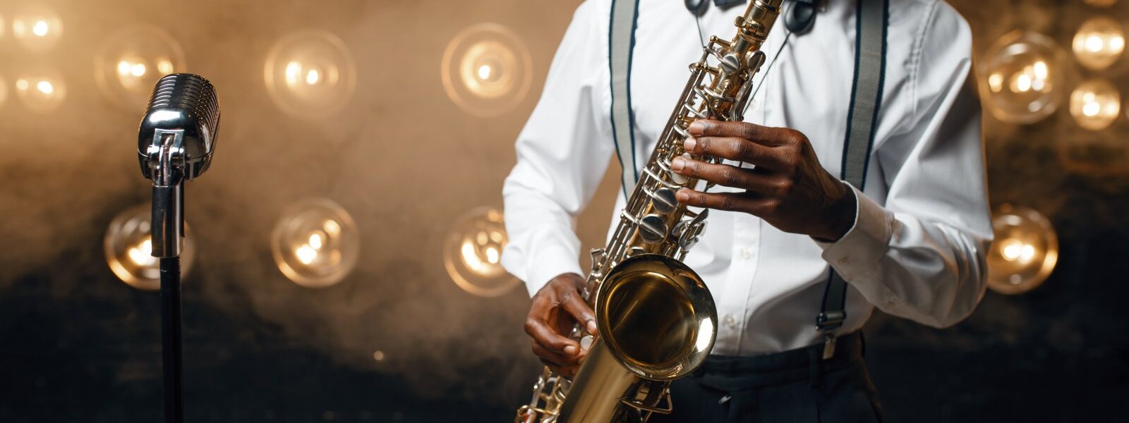 black-jazz-performer-plays-the-saxophone-on-stage-2023-11-27-04-49-15-utc